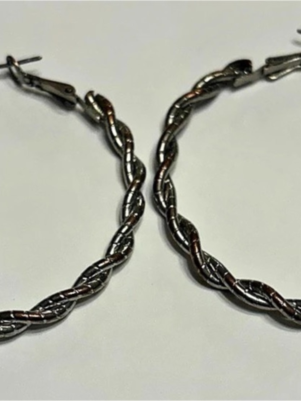 Twisted Hoop Earrings in Silver & Gold Like New
